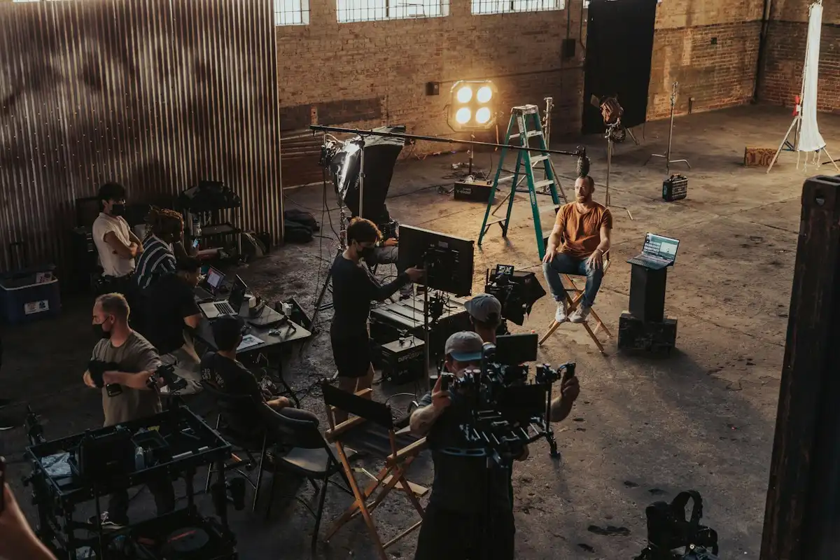 Film crew working around cameras on a production set