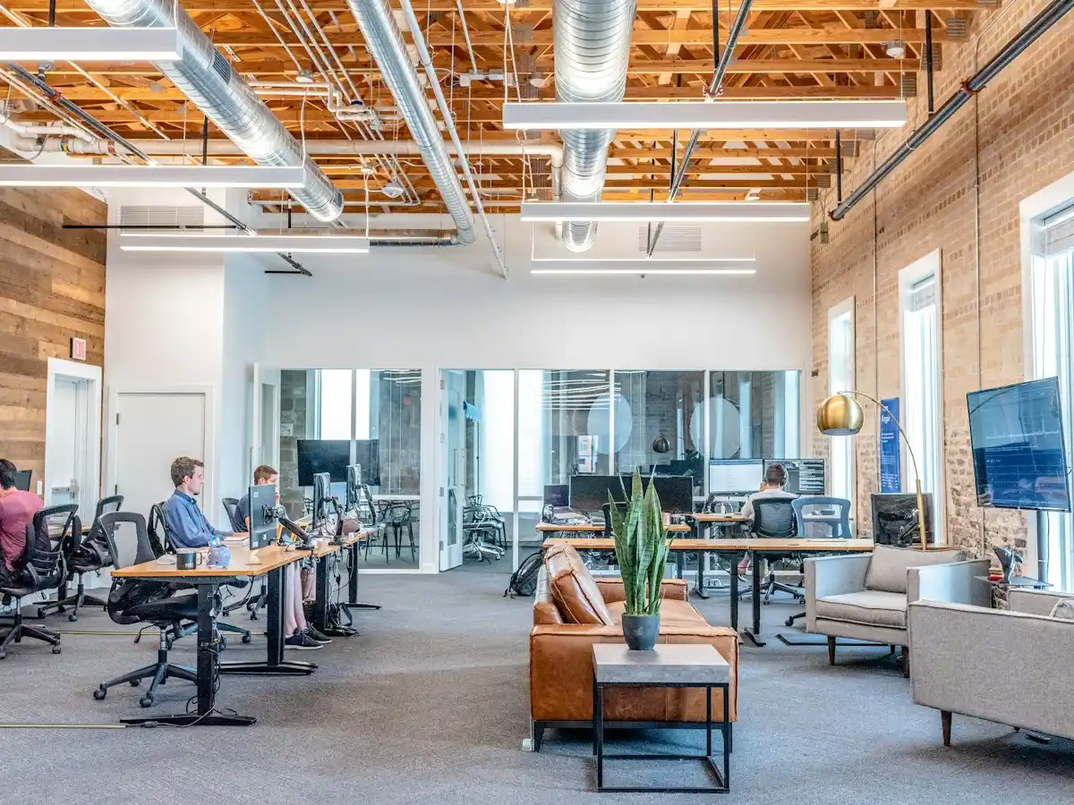 Open-plan office with staff working at their desks