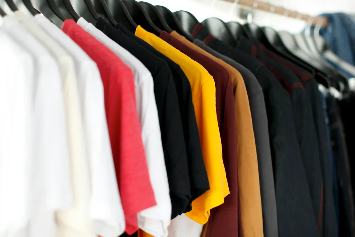 Shirts hanging on a clothing rack
