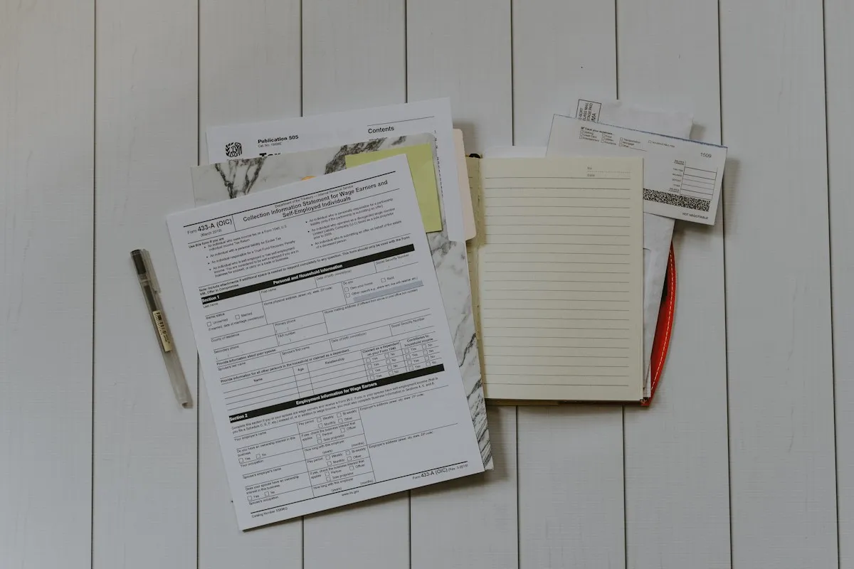 Stack of invoices and papers on a desk